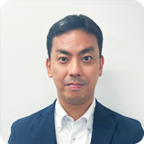 都丸 寿雄 氏